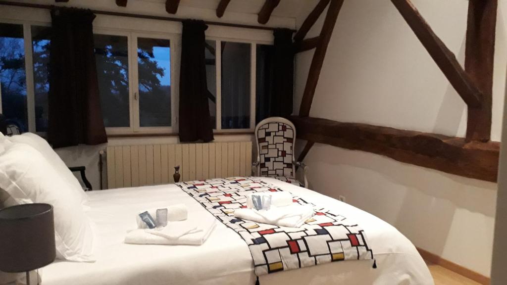 Postel nebo postele na pokoji v ubytování Domaine la jam