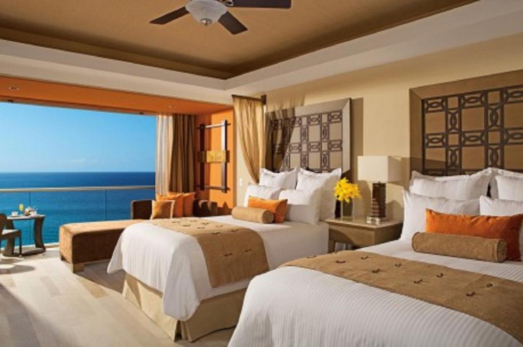 Postel nebo postele na pokoji v ubytování Dreams Vallarta Bay Resorts & Spa - All Inclusive