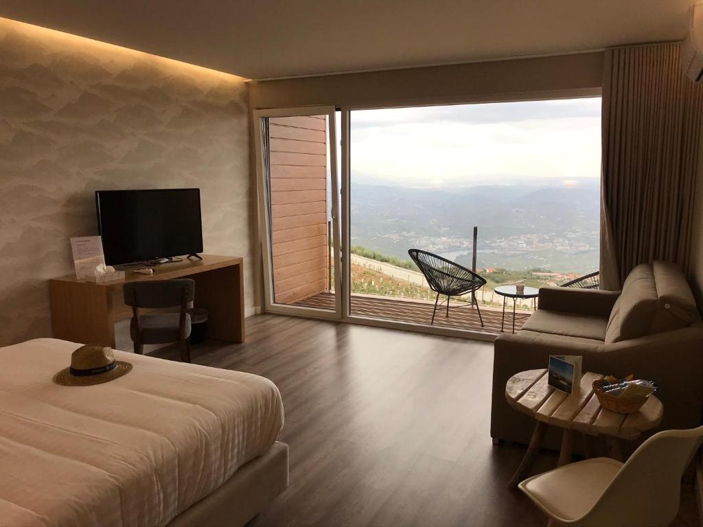 TV a/nebo společenská místnost v ubytování Paraíso Douro AL