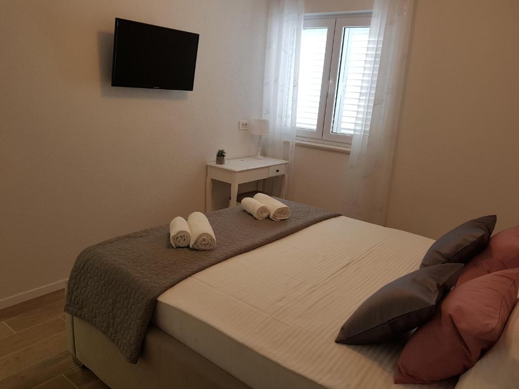 Postel nebo postele na pokoji v ubytování La Vista apartments