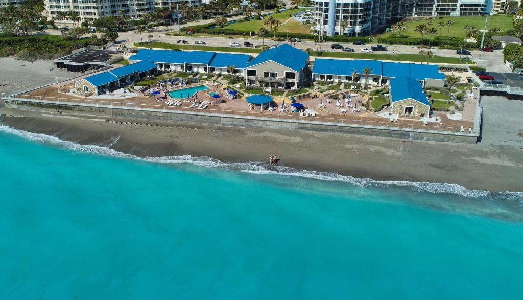 an aerial view of a resort on the beach at Jupiter Reef Club Resort in Jupiter