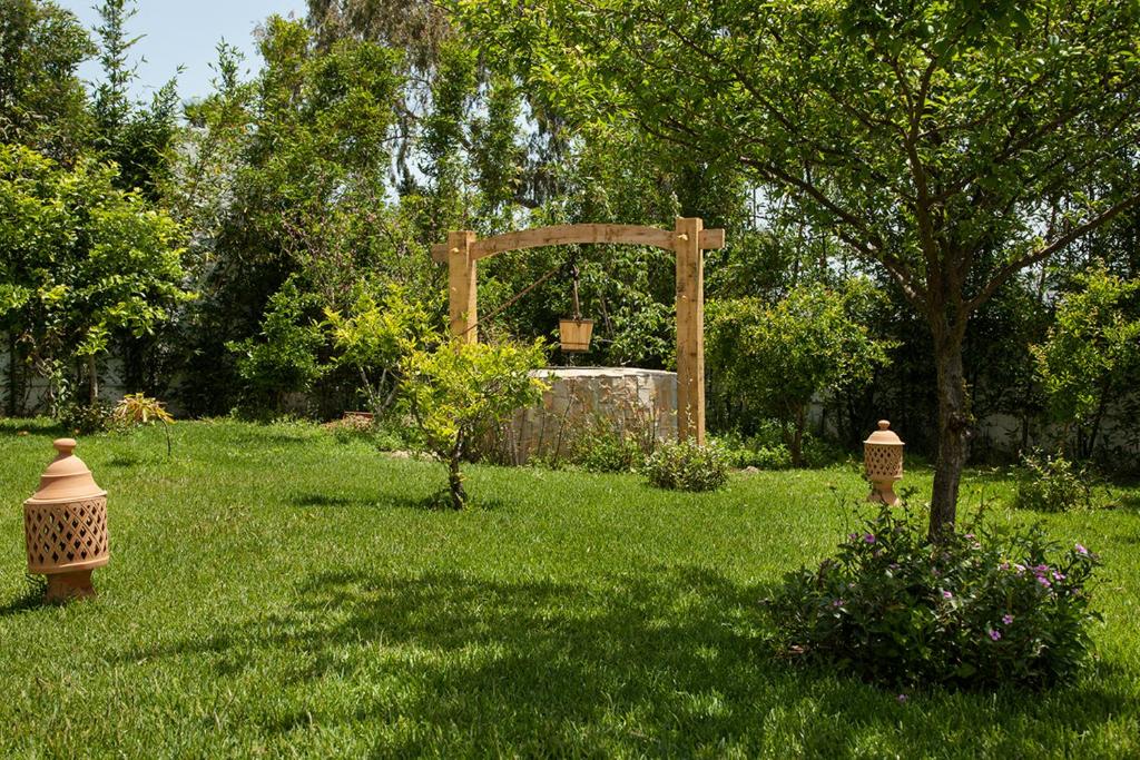 Ein Garten an der Unterkunft Dar Tanja Boutique Hotel