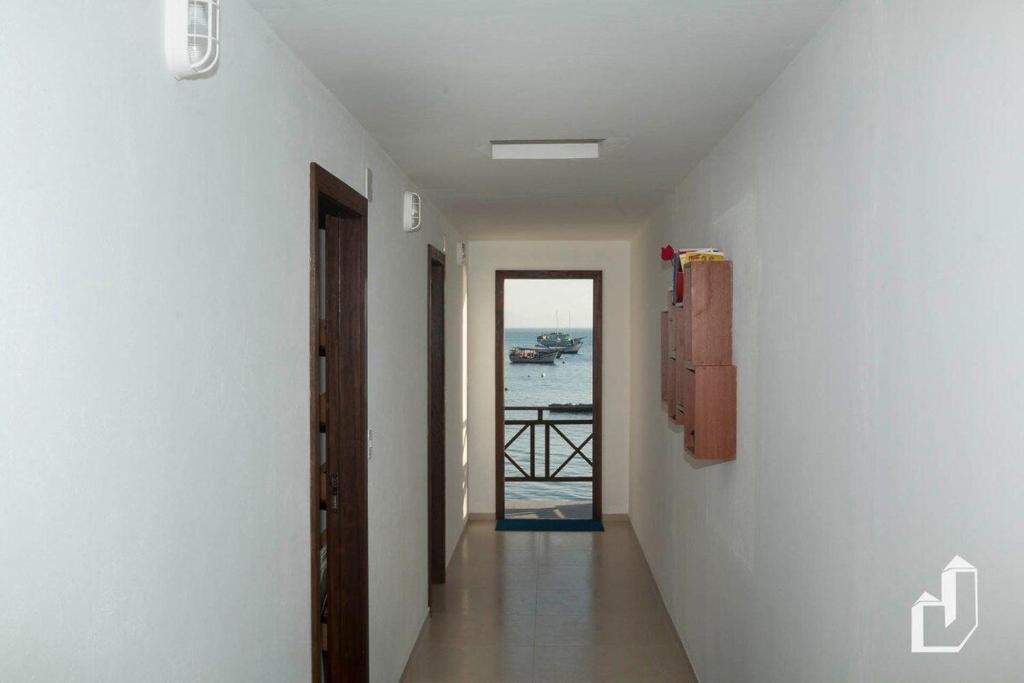  Casa frente ao mar com 03 dormitórios
