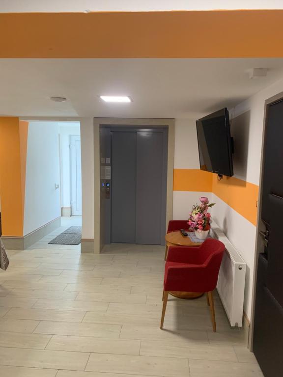 TV a/nebo společenská místnost v ubytování Szelim Motel