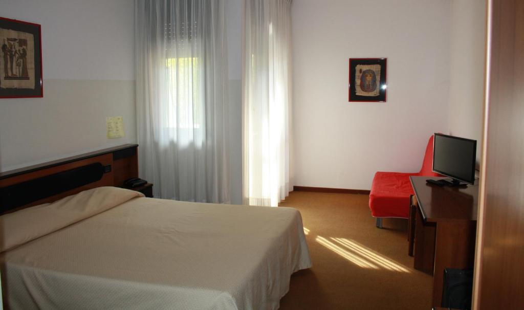 Postel nebo postele na pokoji v ubytování Albergo Ristorante Cicin