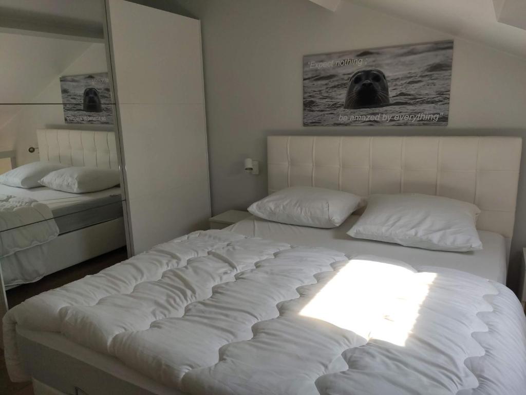 Postel nebo postele na pokoji v ubytování SeaLodge4you