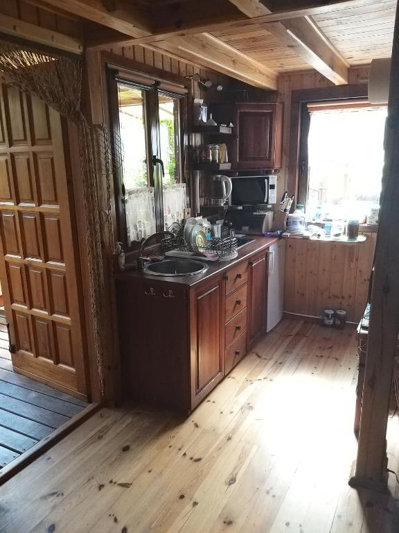 Kuchyň nebo kuchyňský kout v ubytování Domek letniskowy 8 -osobowy