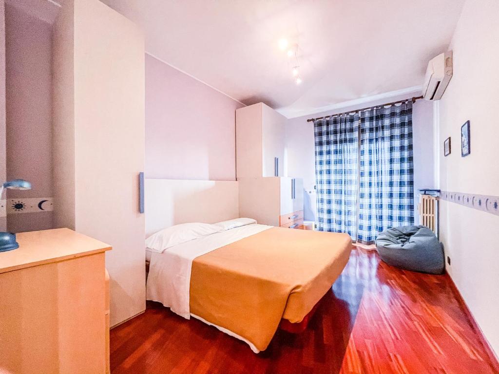 Posteľ alebo postele v izbe v ubytovaní MYHOUSE INN RACCONIGI - Affitti Brevi Italia