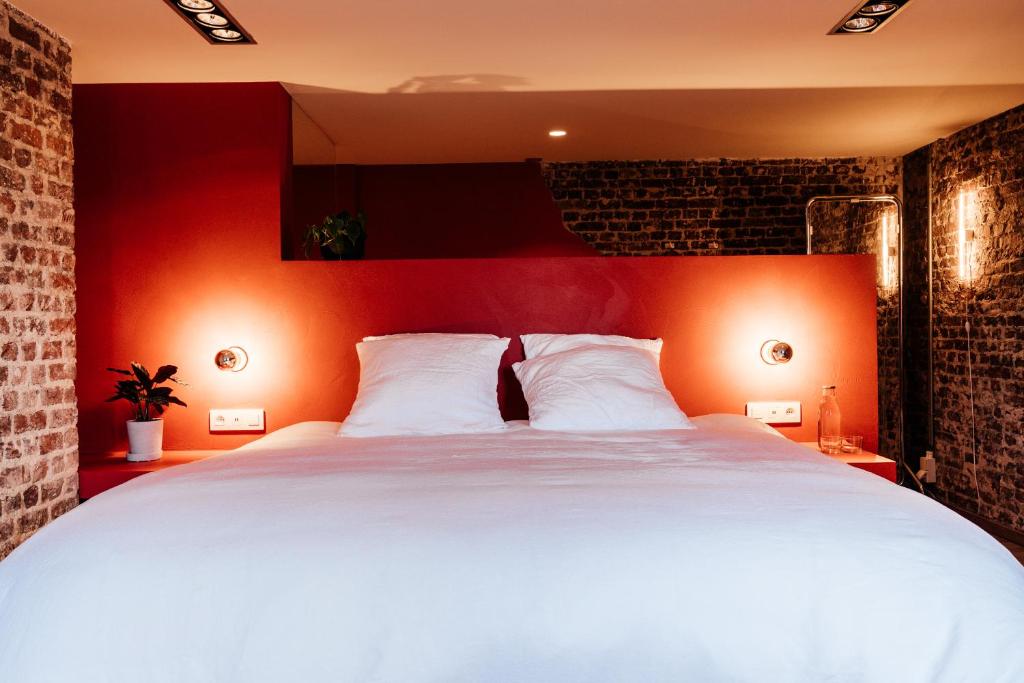 Postel nebo postele na pokoji v ubytování Chambre d'Amis by Alix