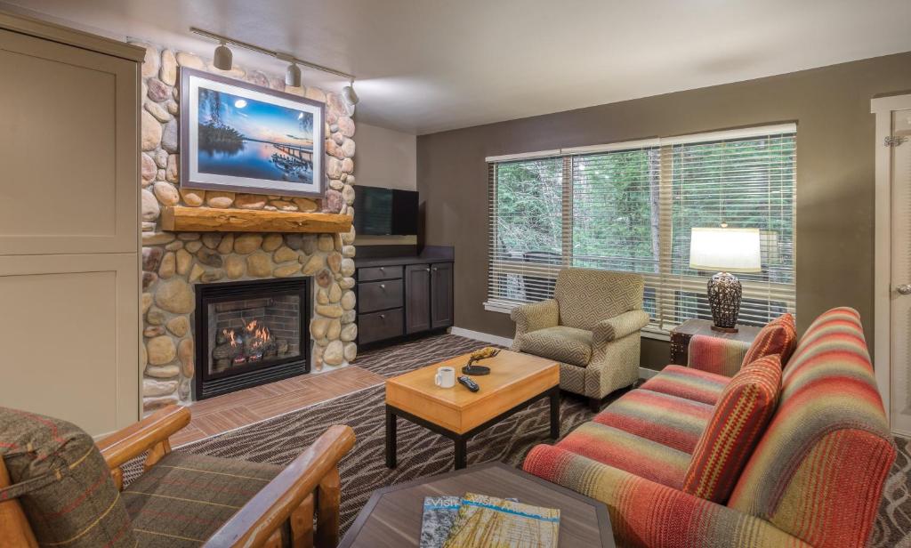 a living room with a couch and a fireplace at WorldMark McCall in McCall