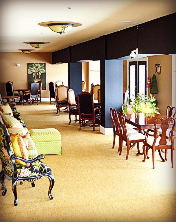 Coin salon dans l'établissement Grant Hall Hotel