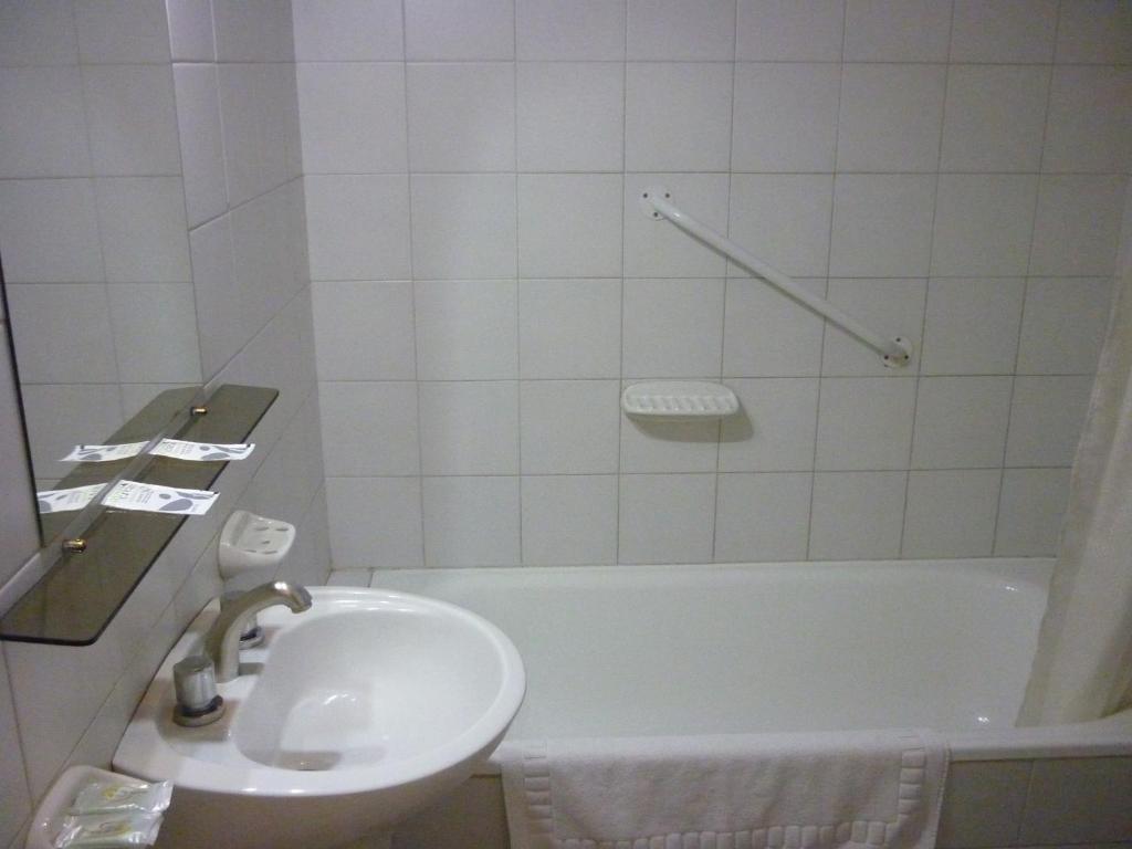 Koupelna v ubytování Hotel Puerta del Sol
