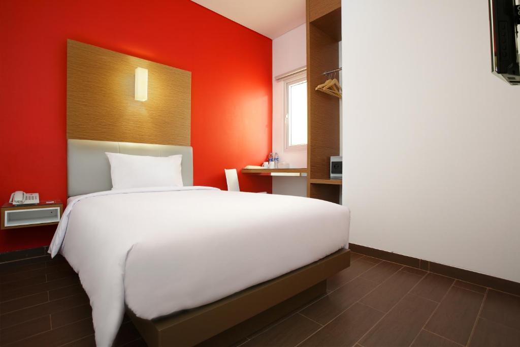 Postel nebo postele na pokoji v ubytování Amaris Hotel Season City