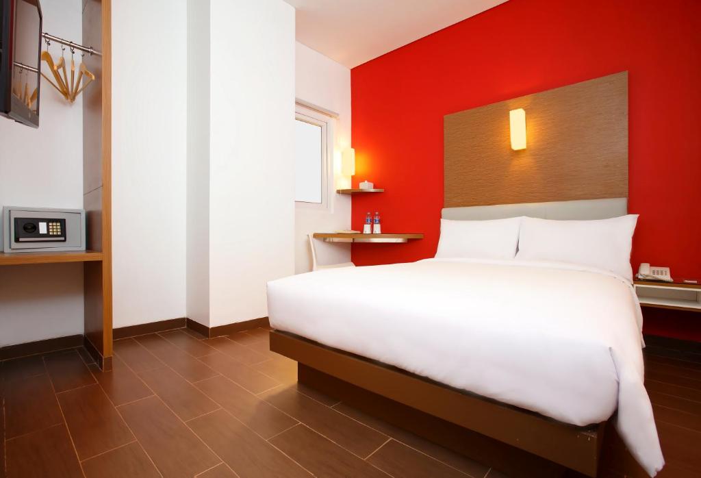 Postel nebo postele na pokoji v ubytování Amaris Hotel Season City