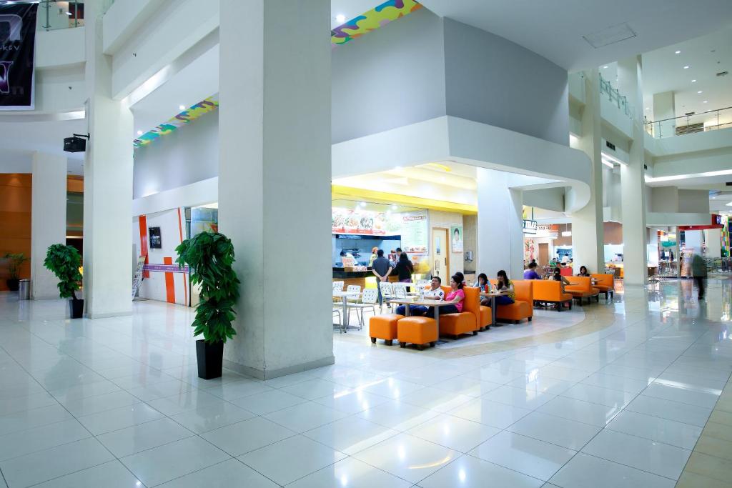 TV a/nebo společenská místnost v ubytování Amaris Hotel Season City