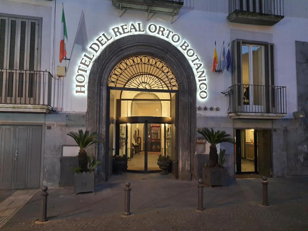 a building with a sign that reads hotel real orthodontics at Hotel del Real Orto Botanico in Naples