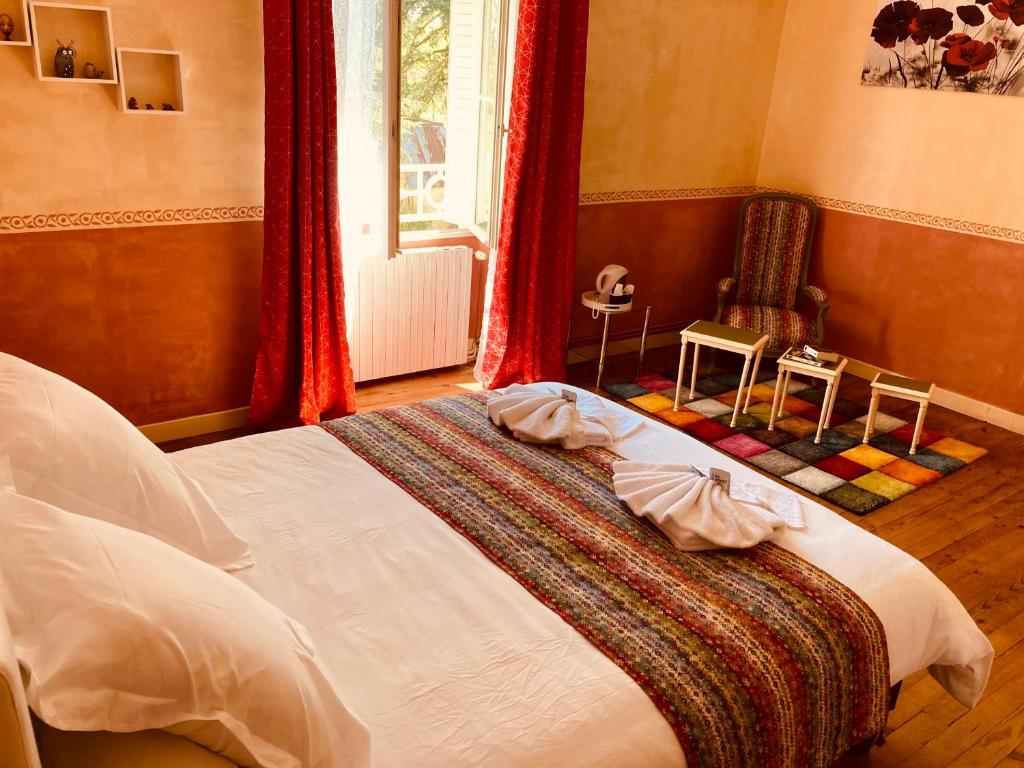 Postel nebo postele na pokoji v ubytování Domaine la jam