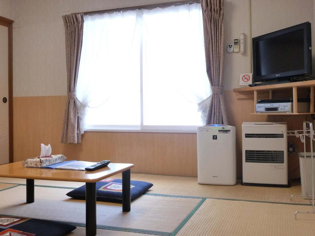 Kuchyň nebo kuchyňský kout v ubytování Pension Kaoru
