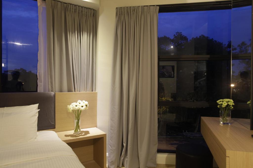 Postel nebo postele na pokoji v ubytování I am Jazz Hotel
