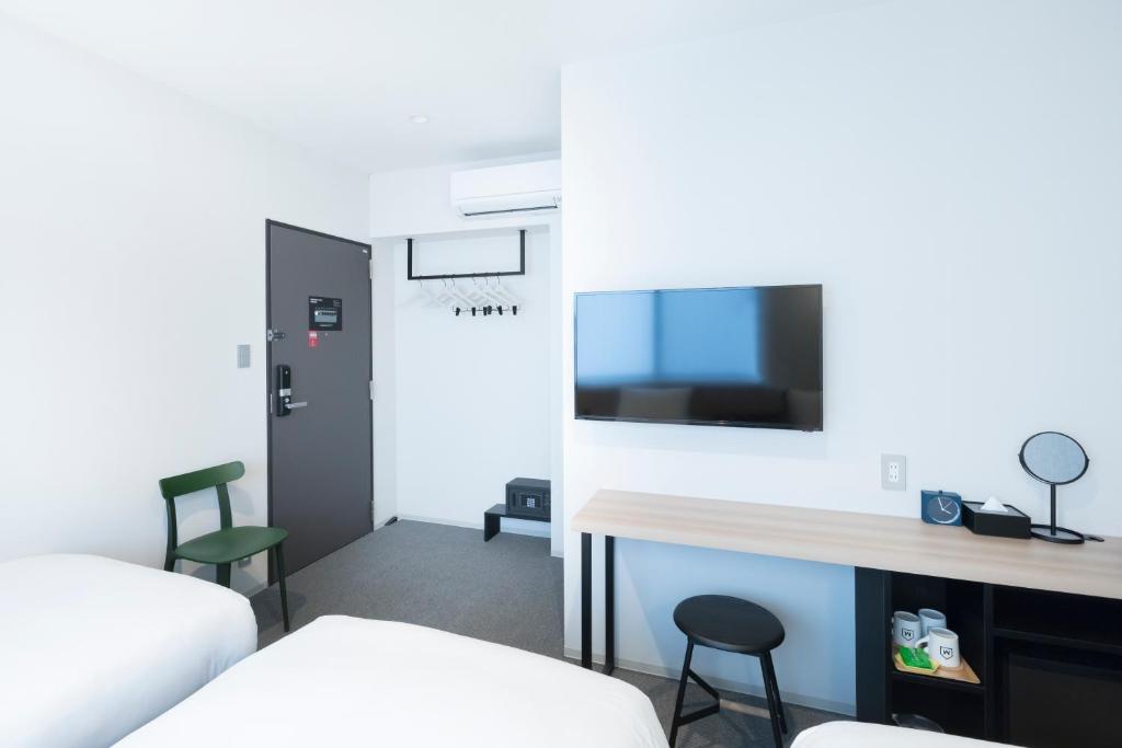 TV a/nebo společenská místnost v ubytování M's Hotel Sanjo Omiya