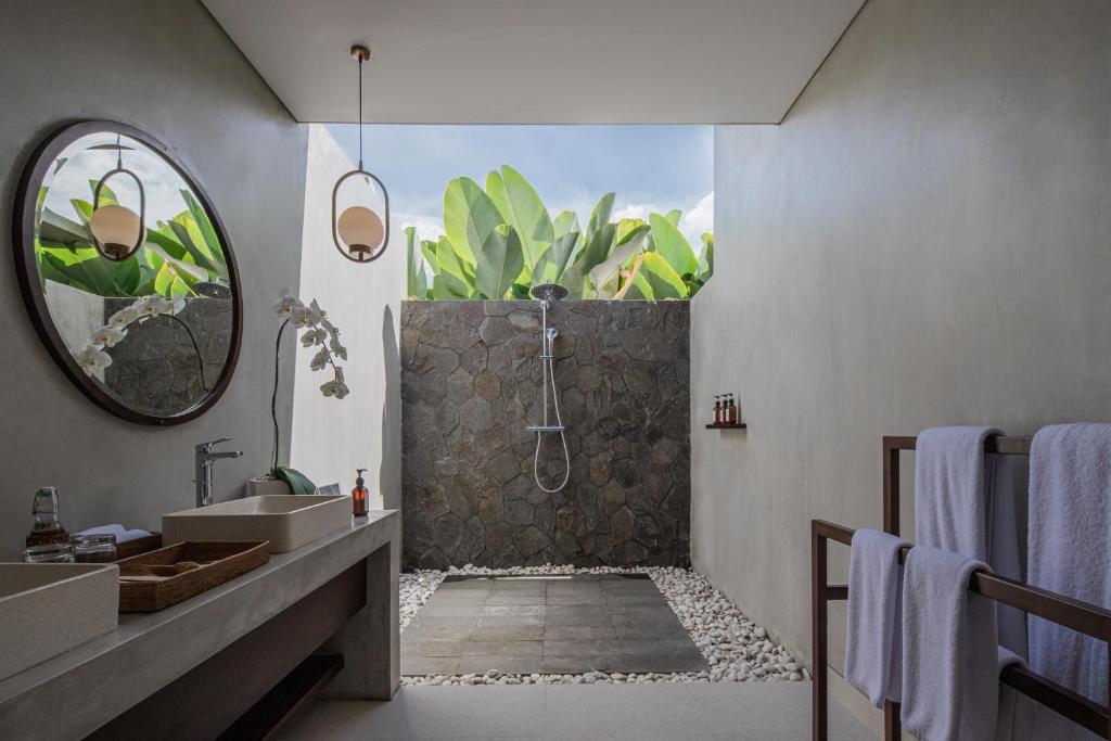 Koupelna v ubytování The Garcia Ubud Hotel & Resort