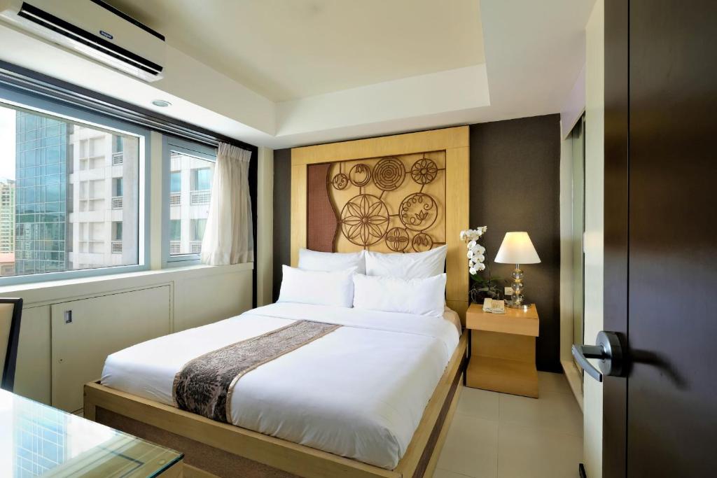 Katil atau katil-katil dalam bilik di Quest Hotel & Conference Center Cebu