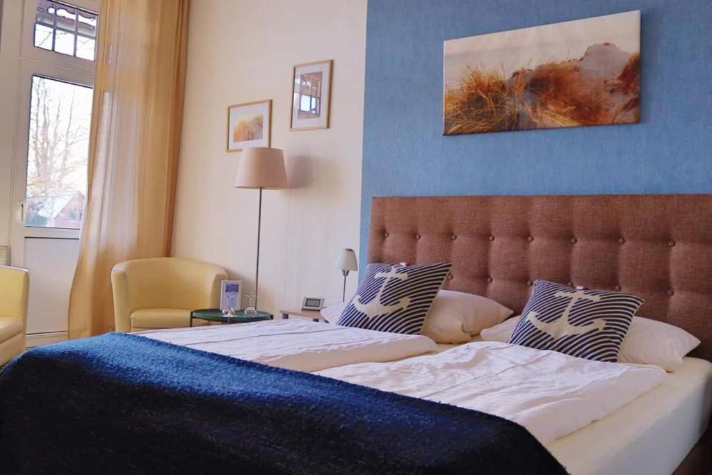 Postel nebo postele na pokoji v ubytování Hotel Schweizerhaus