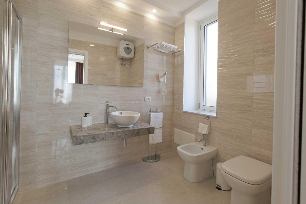 Koupelna v ubytování Esseneto Rooms