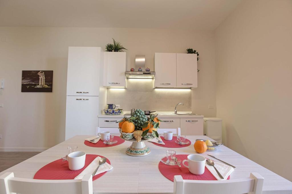 Kuchyň nebo kuchyňský kout v ubytování Esseneto Rooms