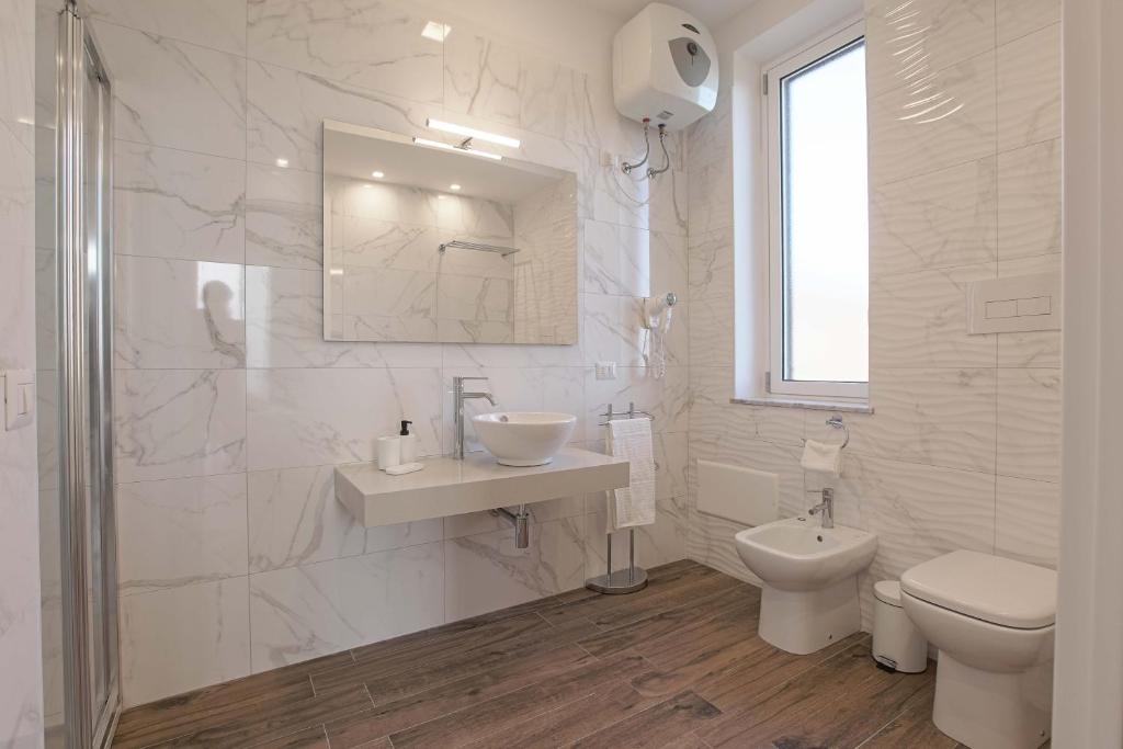 Koupelna v ubytování Esseneto Rooms