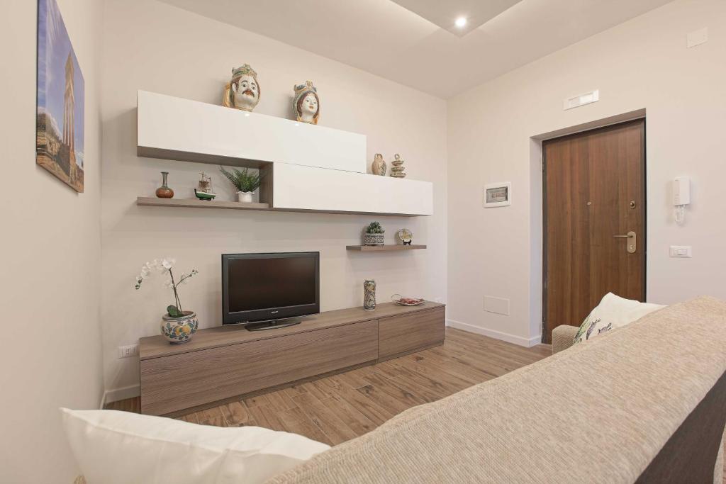 TV a/nebo společenská místnost v ubytování Esseneto Rooms