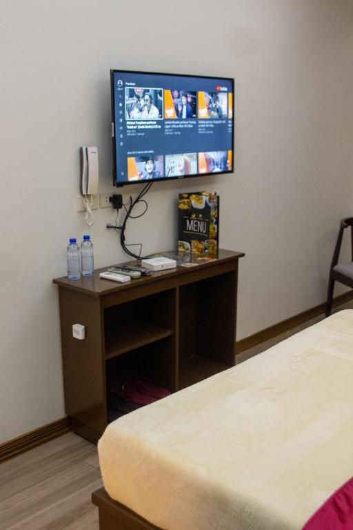 TV a/nebo společenská místnost v ubytování A.M @ 93rd HOTEL