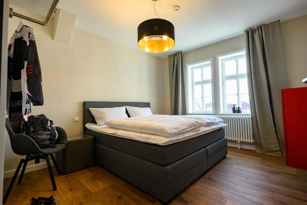 Postel nebo postele na pokoji v ubytování Hotel1601 Inklusionsunternehmen