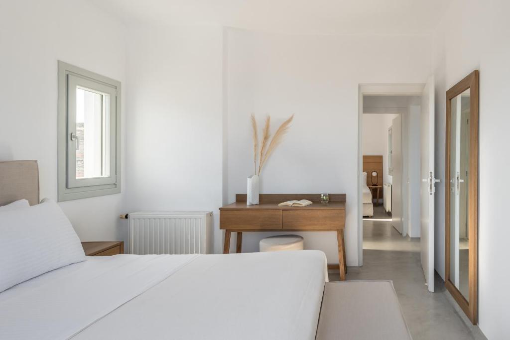 Postel nebo postele na pokoji v ubytování Nevermind Vacations villa A
