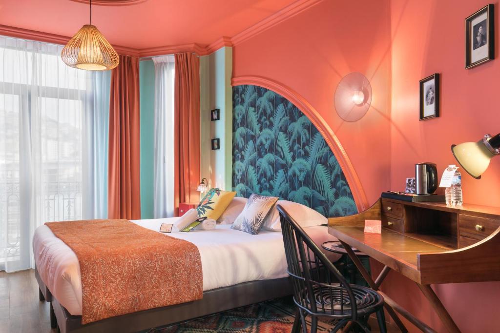Katil atau katil-katil dalam bilik di Villa Bougainville by Happyculture