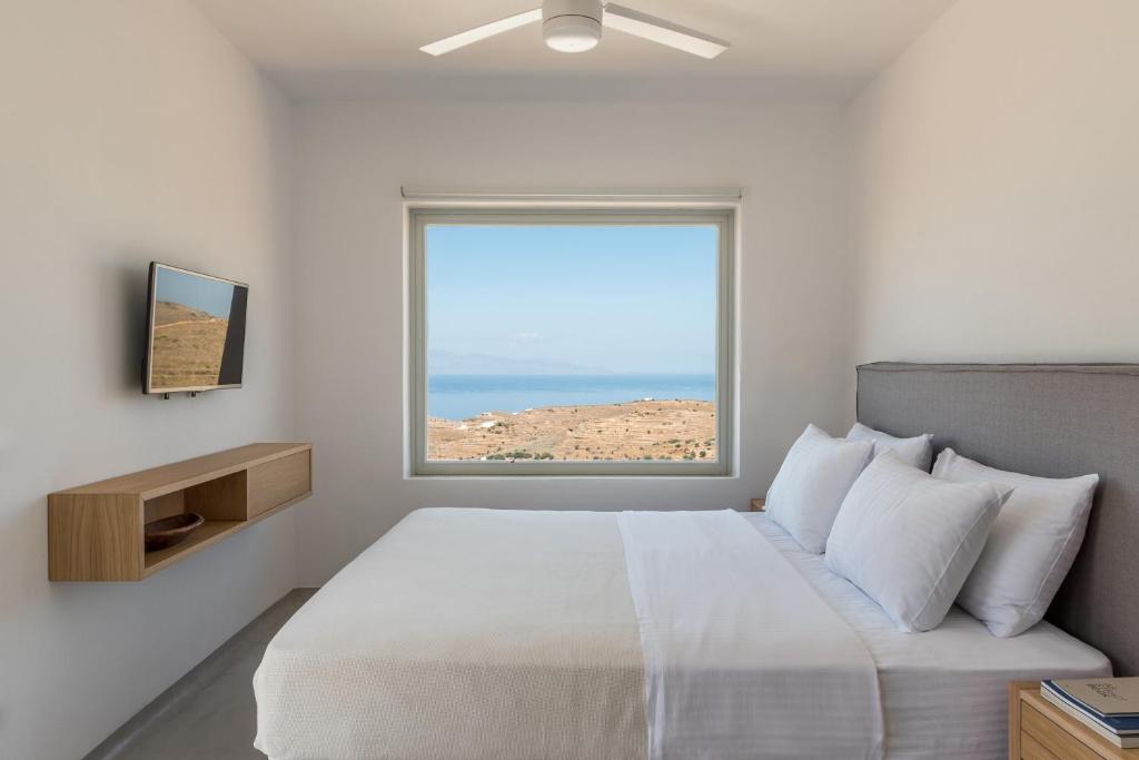 Postel nebo postele na pokoji v ubytování Nevermind Vacations villa A
