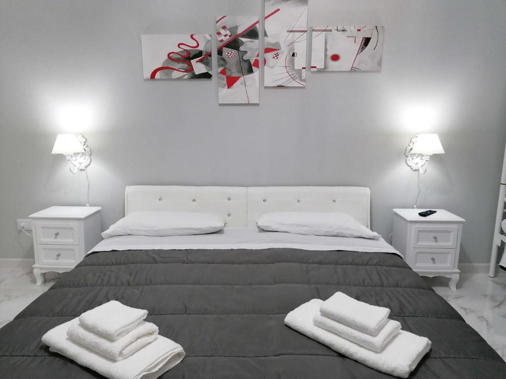Postel nebo postele na pokoji v ubytování B&B WHITE HOUSE