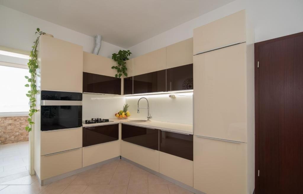Kuchyň nebo kuchyňský kout v ubytování Apartment Marcela