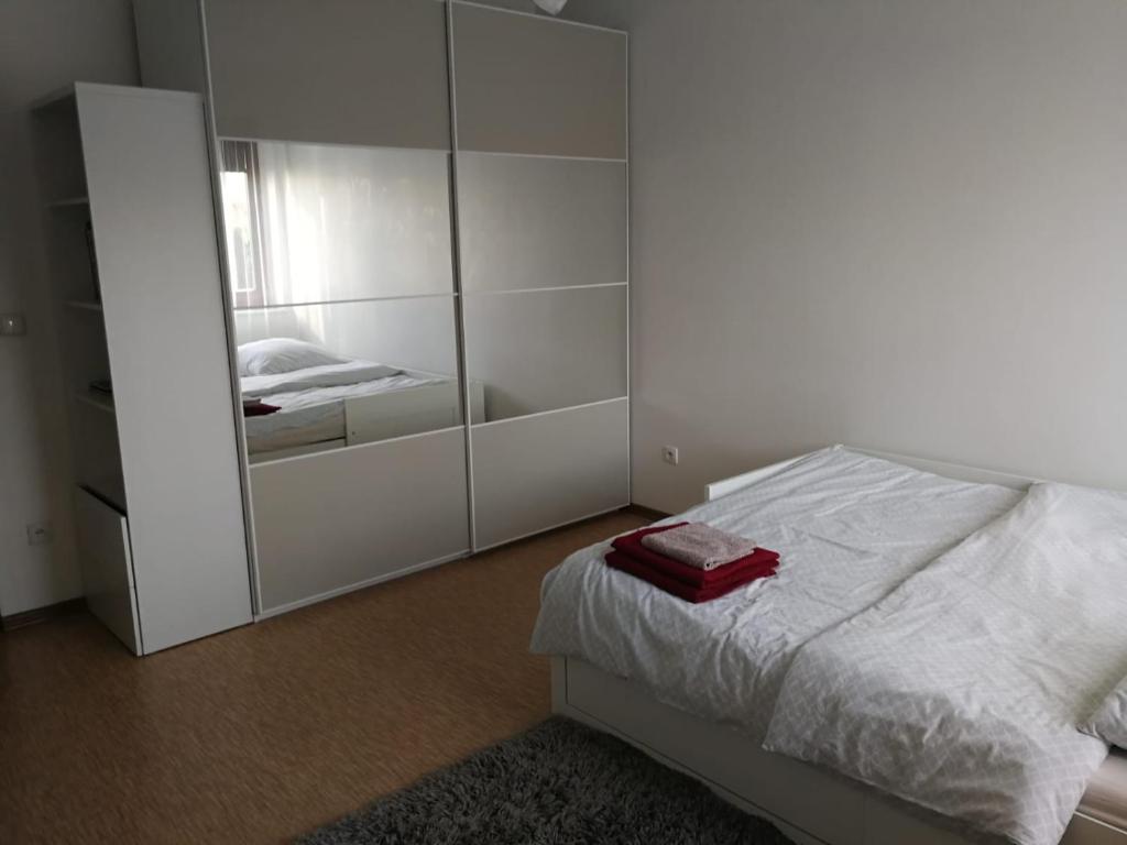 Posteľ alebo postele v izbe v ubytovaní Apartament Zeta Park Centrum