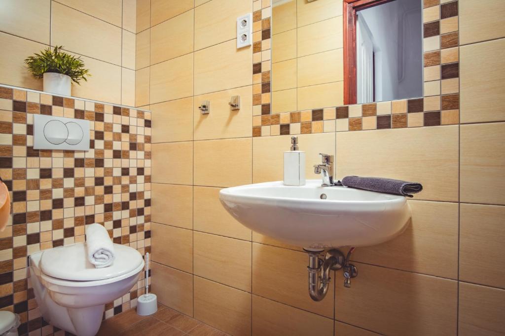 Kúpeľňa v ubytovaní MyFlat Piroska Holiday Home