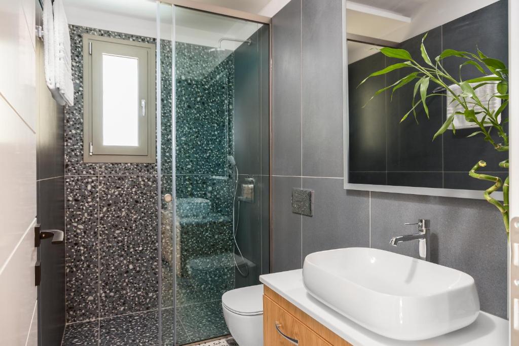 Koupelna v ubytování paleo villas