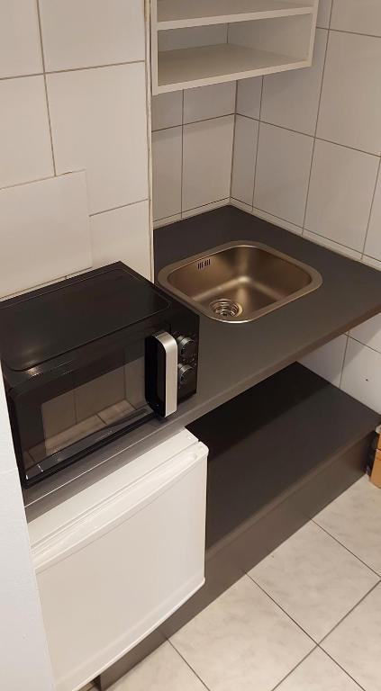Kuchyň nebo kuchyňský kout v ubytování Hotel Stuttgart 21