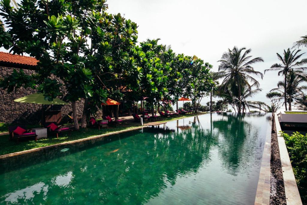 Bazén v ubytování UTMT - Underneath The Mango Tree Spa & Beach Resort nebo v jeho okolí