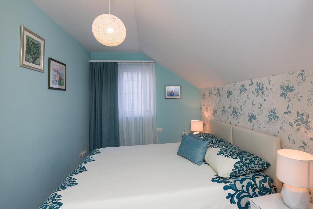 Posteľ alebo postele v izbe v ubytovaní Cetinic Apartment