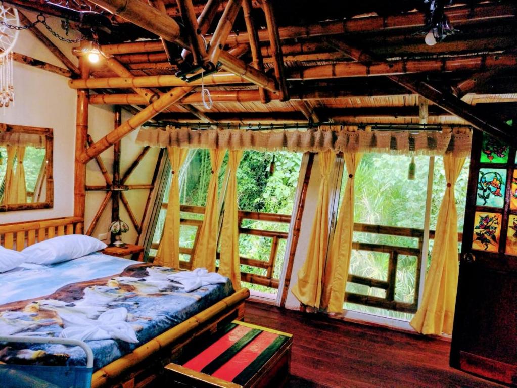 Postel nebo postele na pokoji v ubytování Hospedaje Rural Tupinamba