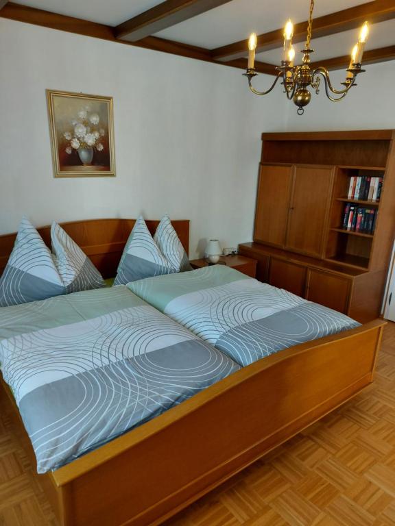 Postel nebo postele na pokoji v ubytování Ferienhaus und Ferienappartements Brunner