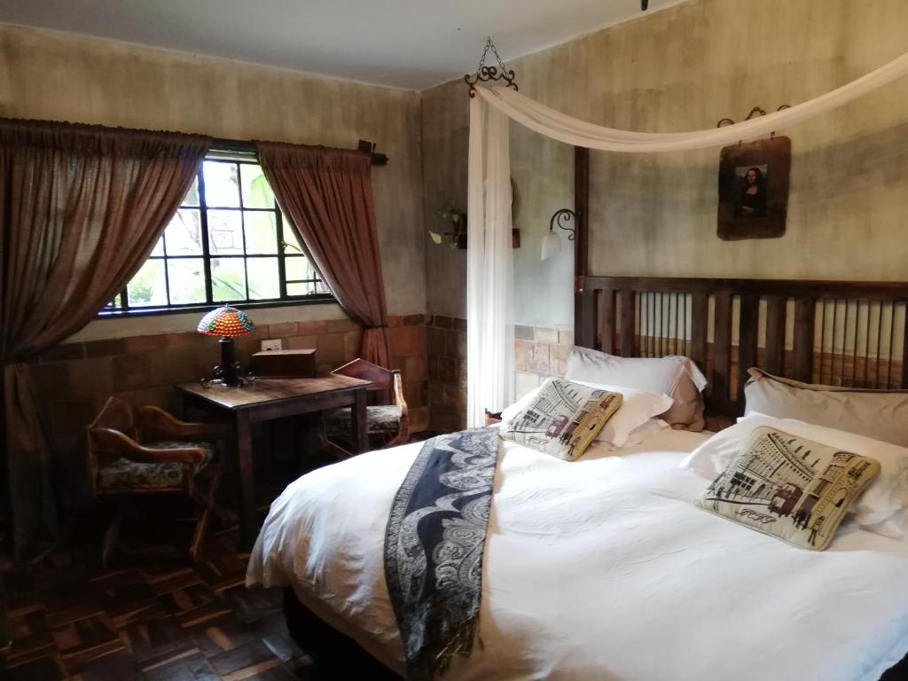 Ένα ή περισσότερα κρεβάτια σε δωμάτιο στο Kings Castle