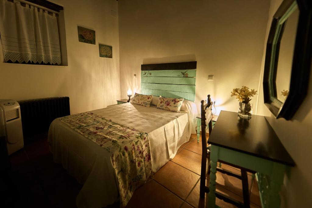 Posteľ alebo postele v izbe v ubytovaní Casa Rural Tornerías
