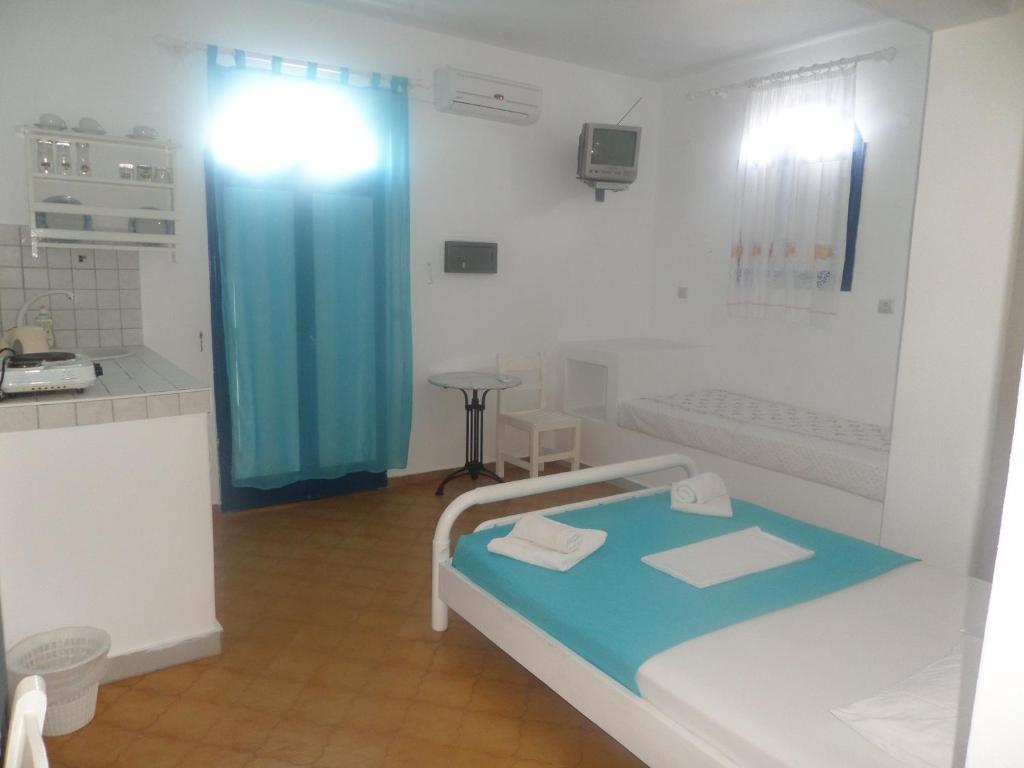 Cama o camas de una habitación en Princess Santorini Villa