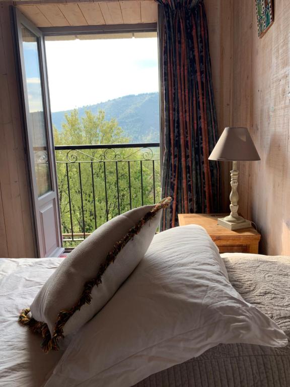 Postel nebo postele na pokoji v ubytování Mas le Nogier Gites Apartments